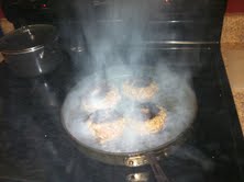 Yeah, you're probably wondering why I'm taking the picture and not saving the burgers. I'm wondering the same thing now too.  Poor burgers.